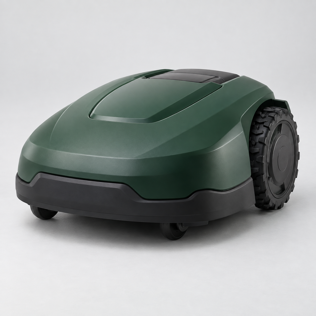 Compact green robotic lawn mower with a smooth oval shell