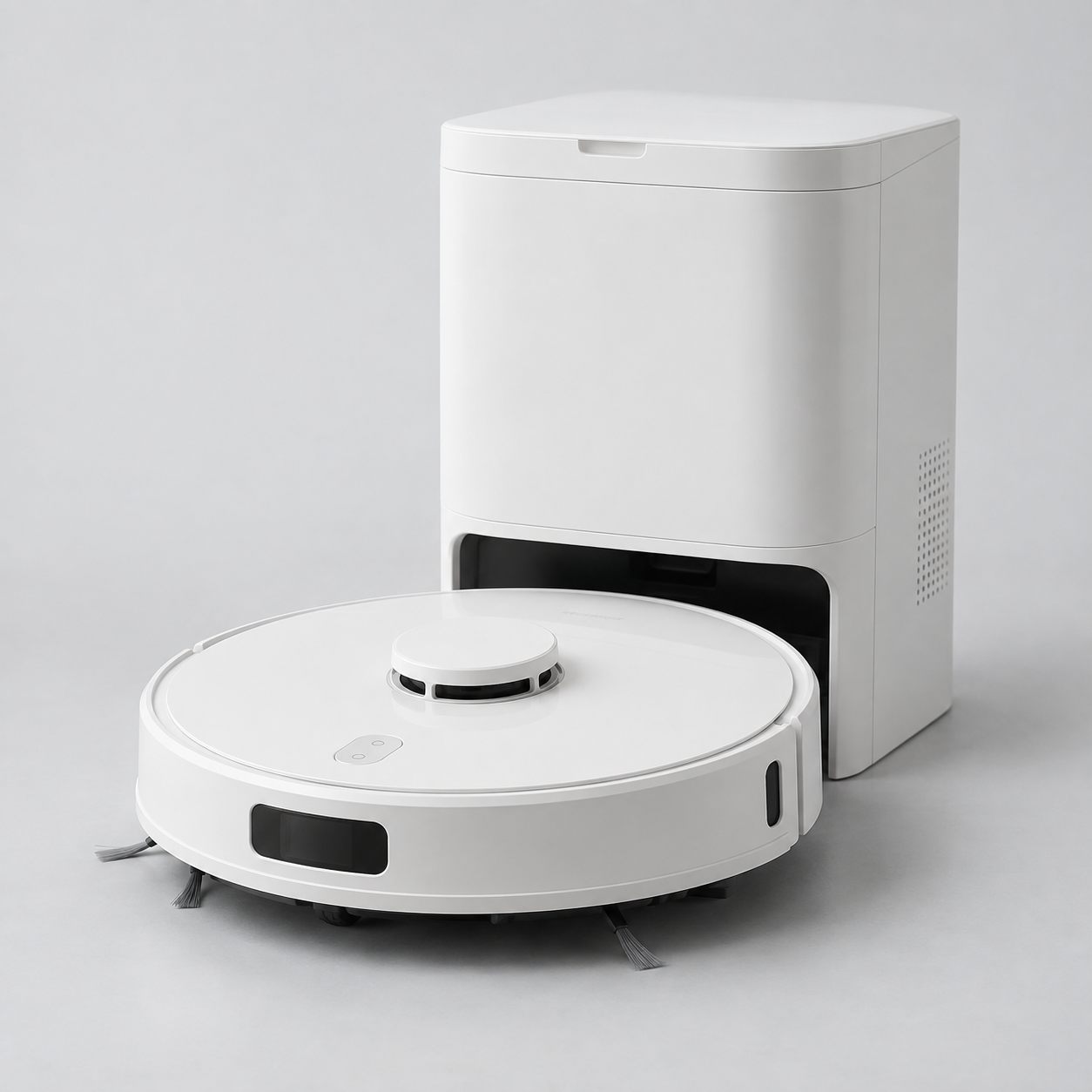 White robot vacuum with a tall matching docking station